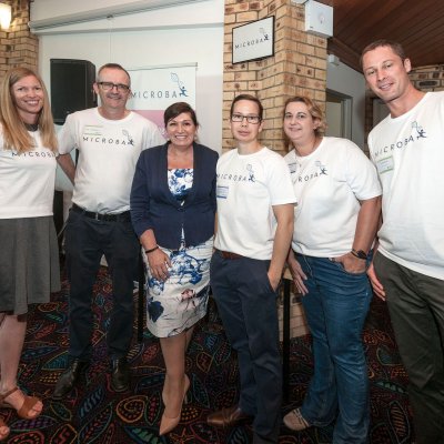 Minister for Innovation, Science and the Digital Economy and Minister for Small Business Leeanne Enoch with team members from Microba 